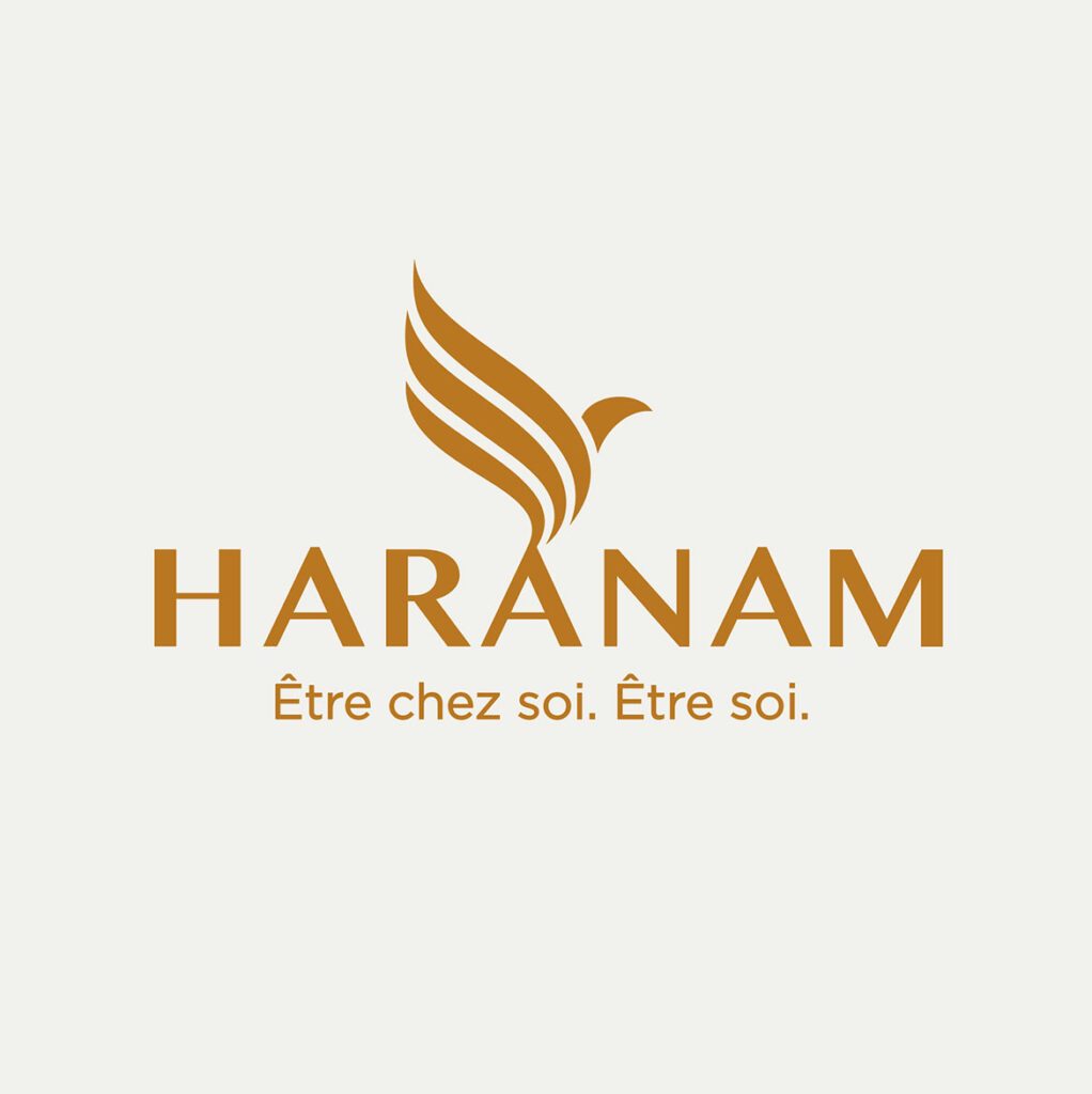 Logo Haranam sur fond blanc avec sa signature de marque