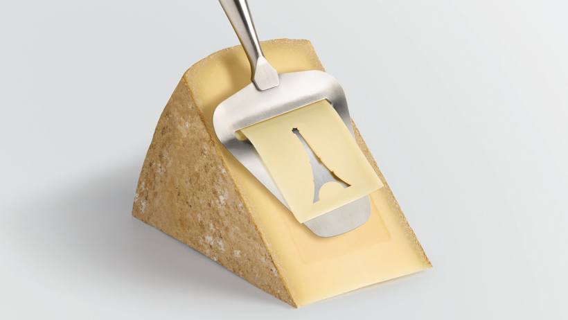 Visuel du Salon du fromage 2020 morceau de Conté avec raclette formant un pochoir de la tour Eiffel